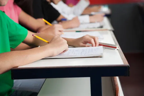 depositphotos_33013187-stock-photo-high-school-students-writing-on